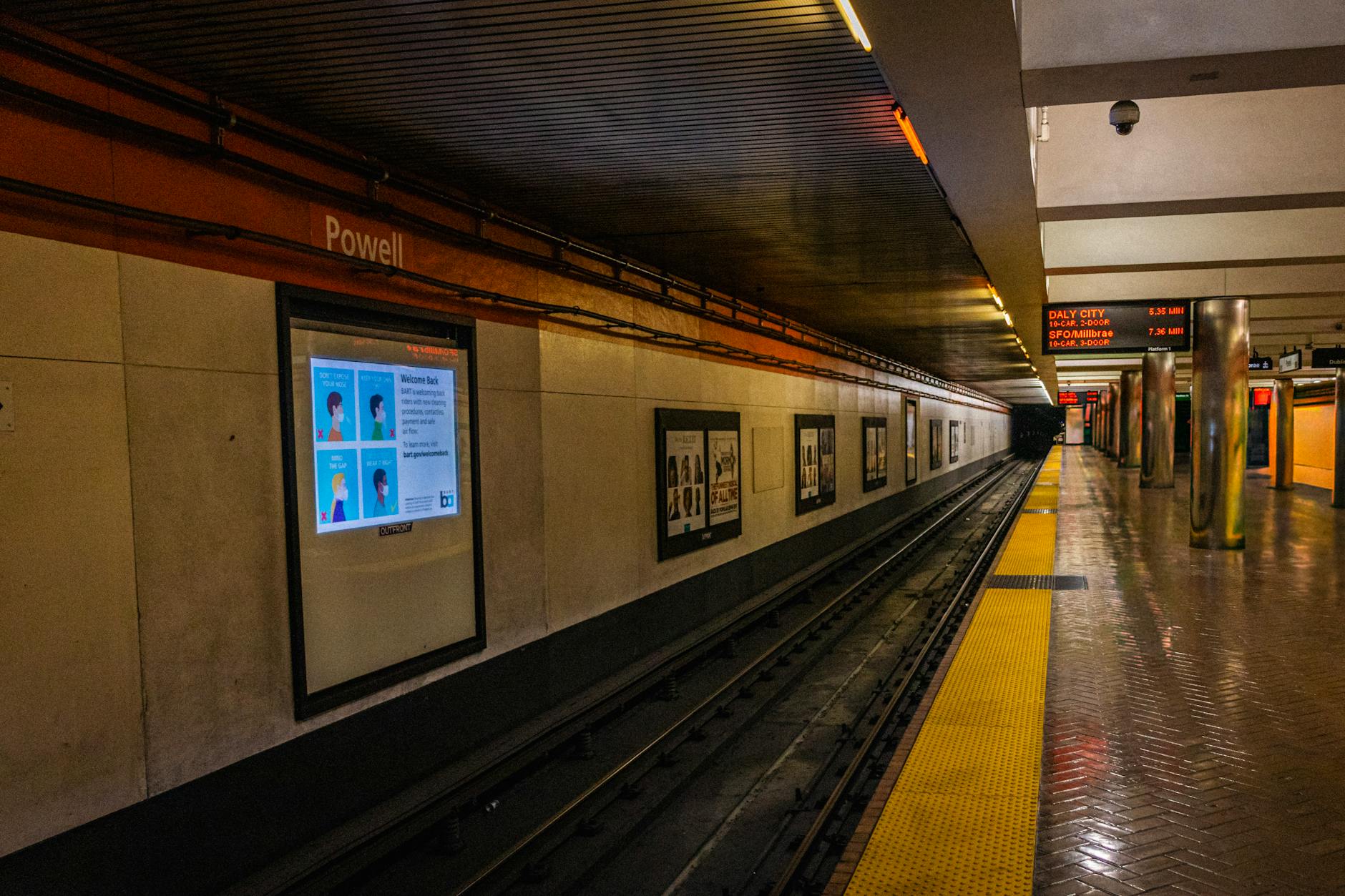 Empty subway platform at Powell Street BART Station in San Francisco.