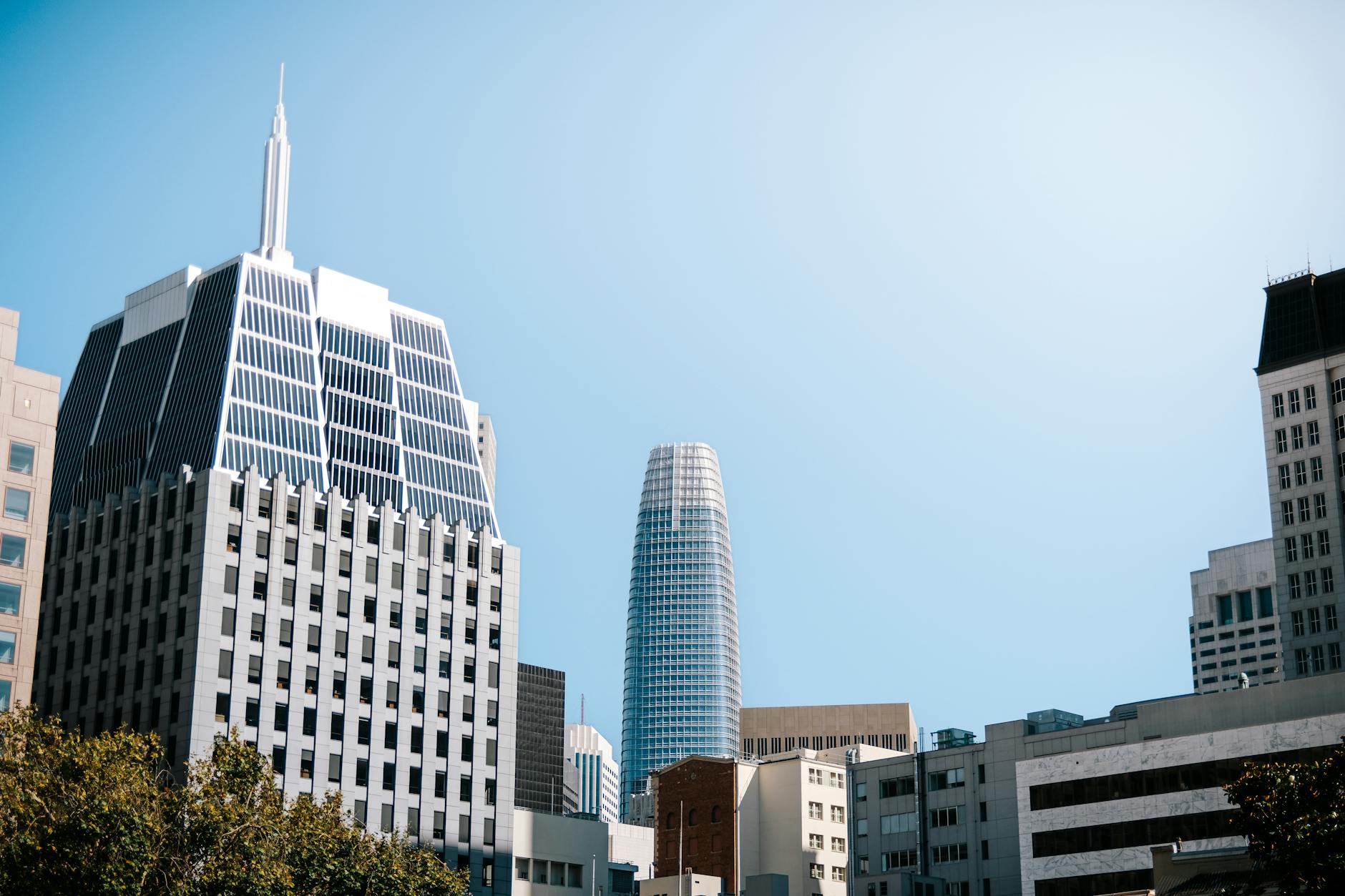 Modern skyscrapers beneath a clear sky in downtown San Francisco.